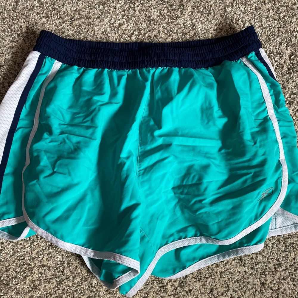 Teal Reebok running shorts Medium M.